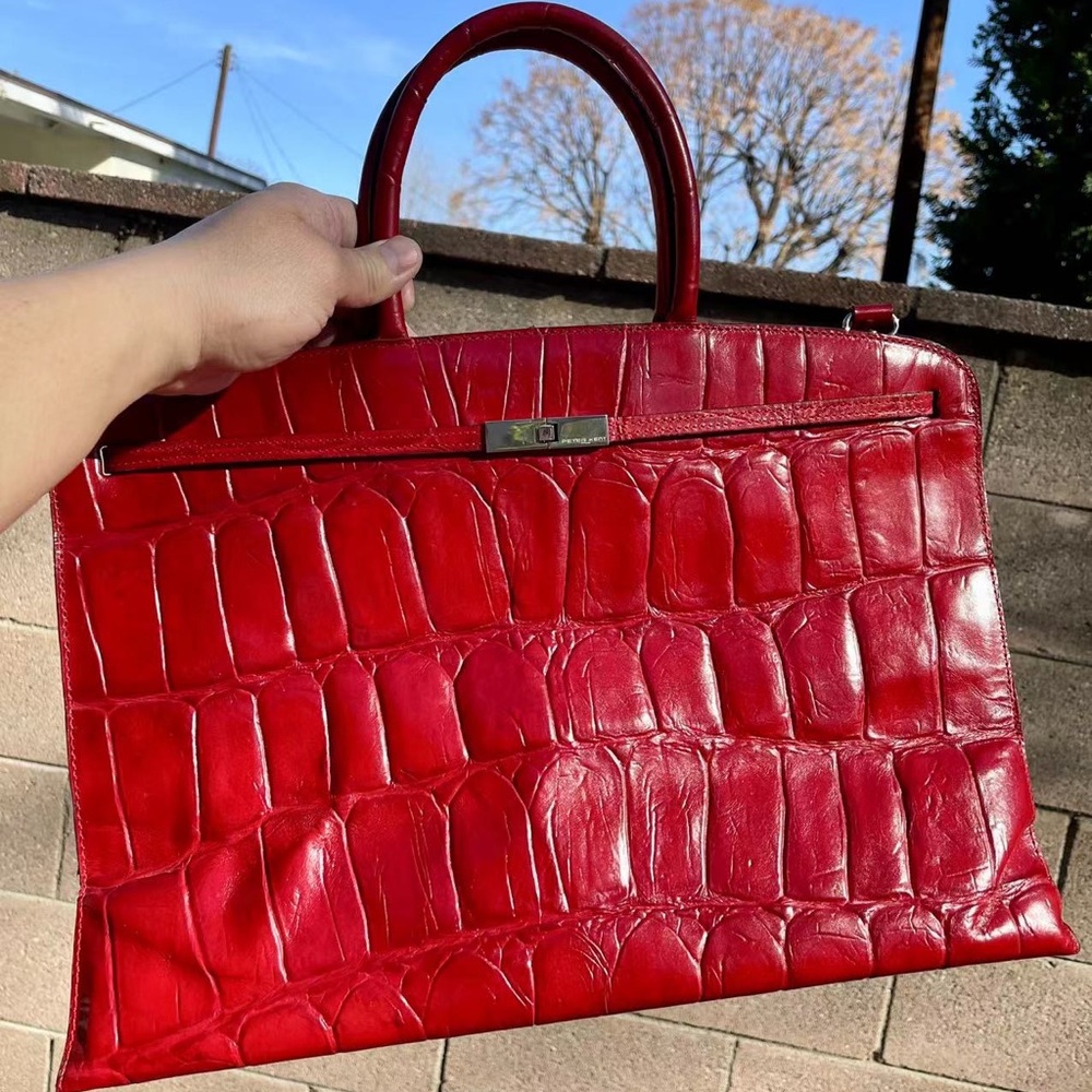Peter Kent alligator style bright red bag